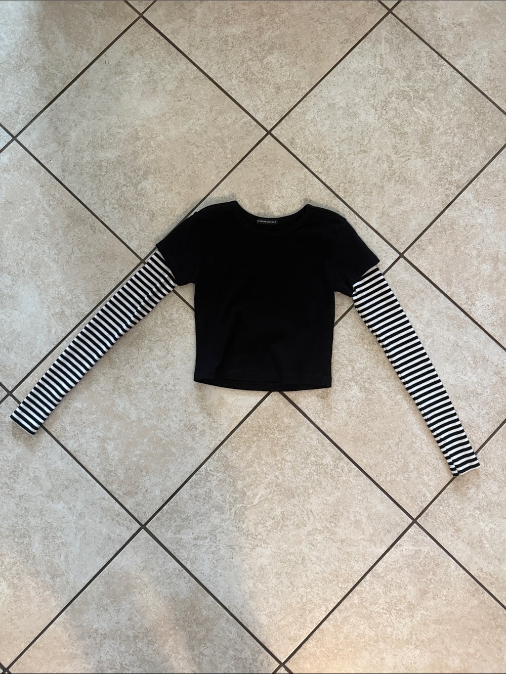 Brandy Melville Black Top with Black-and-White Striped Sleeves